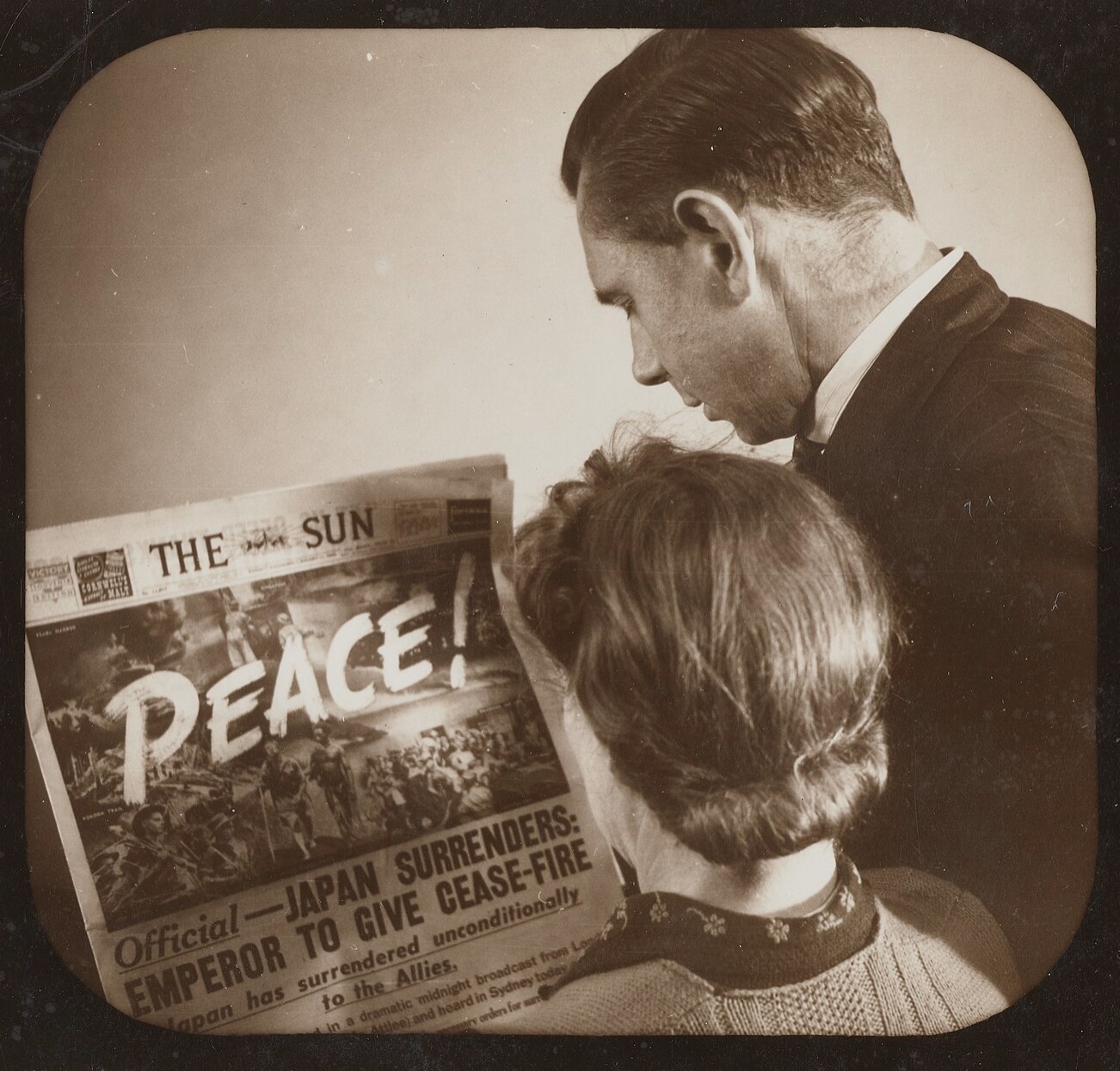 “Japan Surrenders” newspaper headlines.